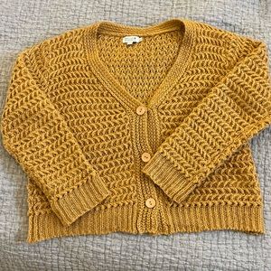 Loose knit mustard coloured cardigan in size medium-large